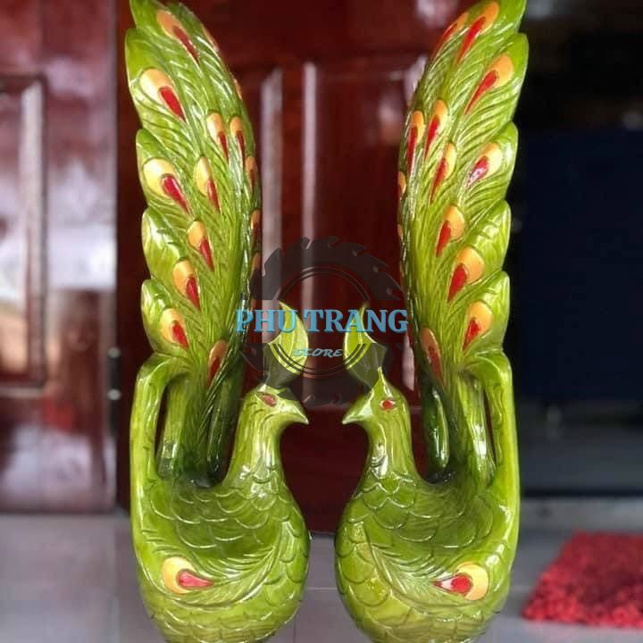 Cặp tượng gỗ Chim Công đổi màu